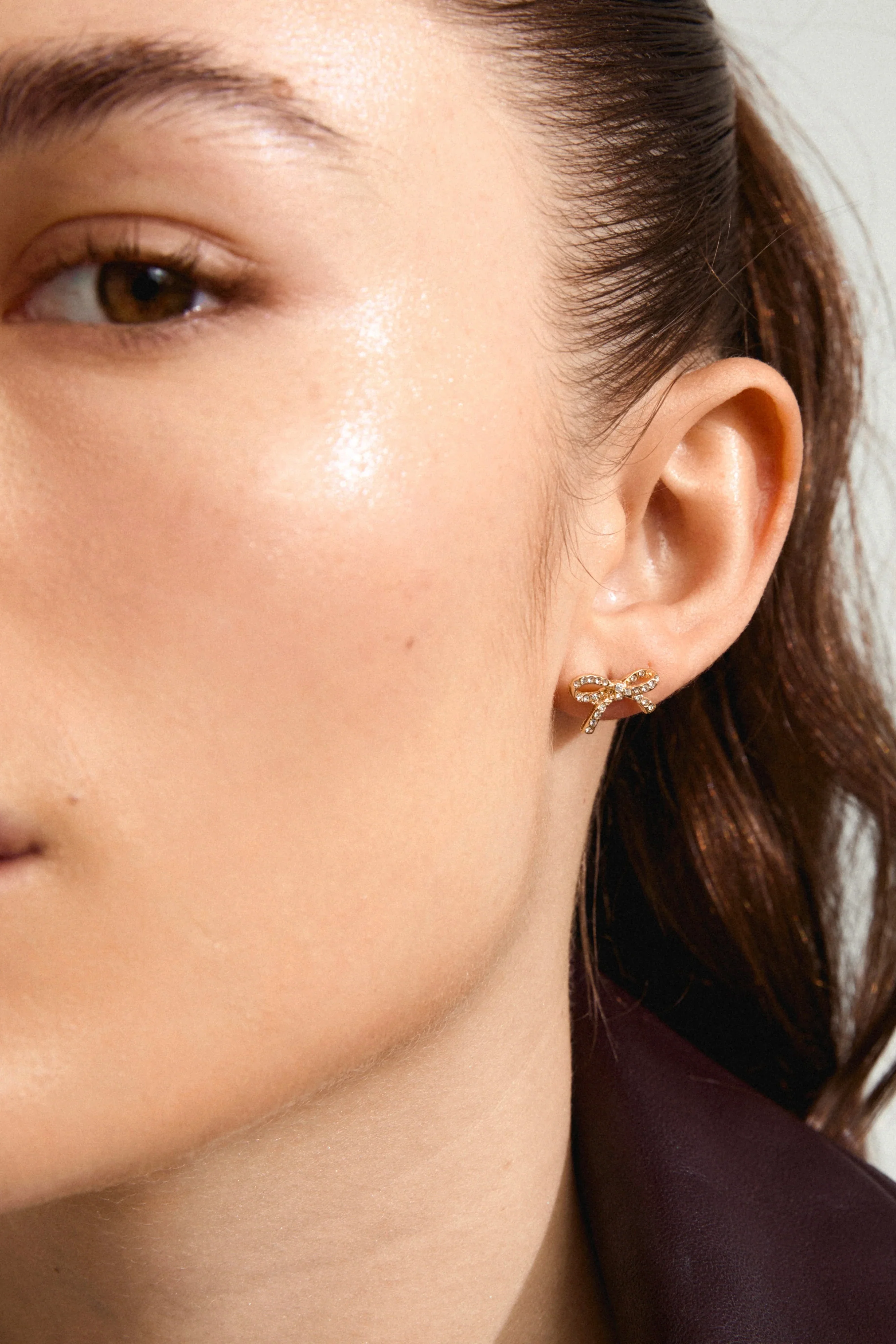 Catharina Small EOL Crystal Gold Bow Stud Earrings - Image 3